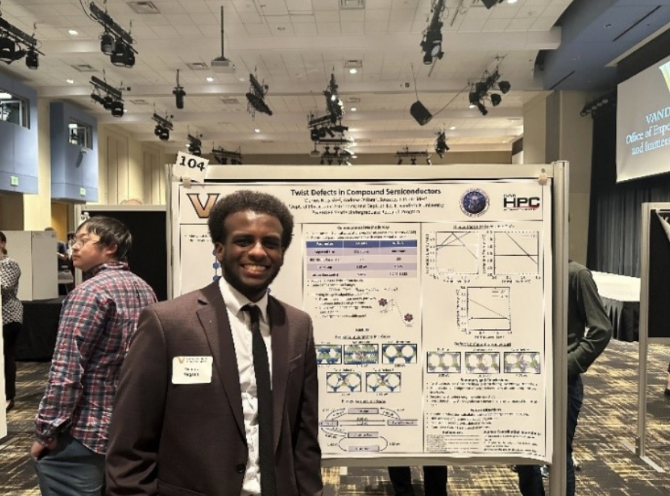 Demos Negash (’25) presents research completed with Professor Sokrates Pantelides at the Vanderbilt Undergraduate Research Fair. Photo credit: Demos Negash (’25) 